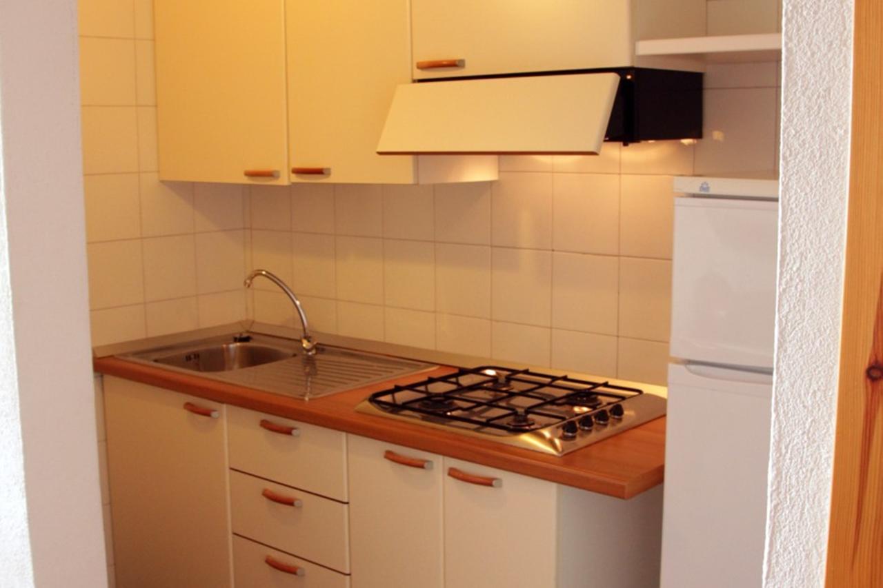 Residence Portolaconia Appartamenti Каниджоне Стая снимка