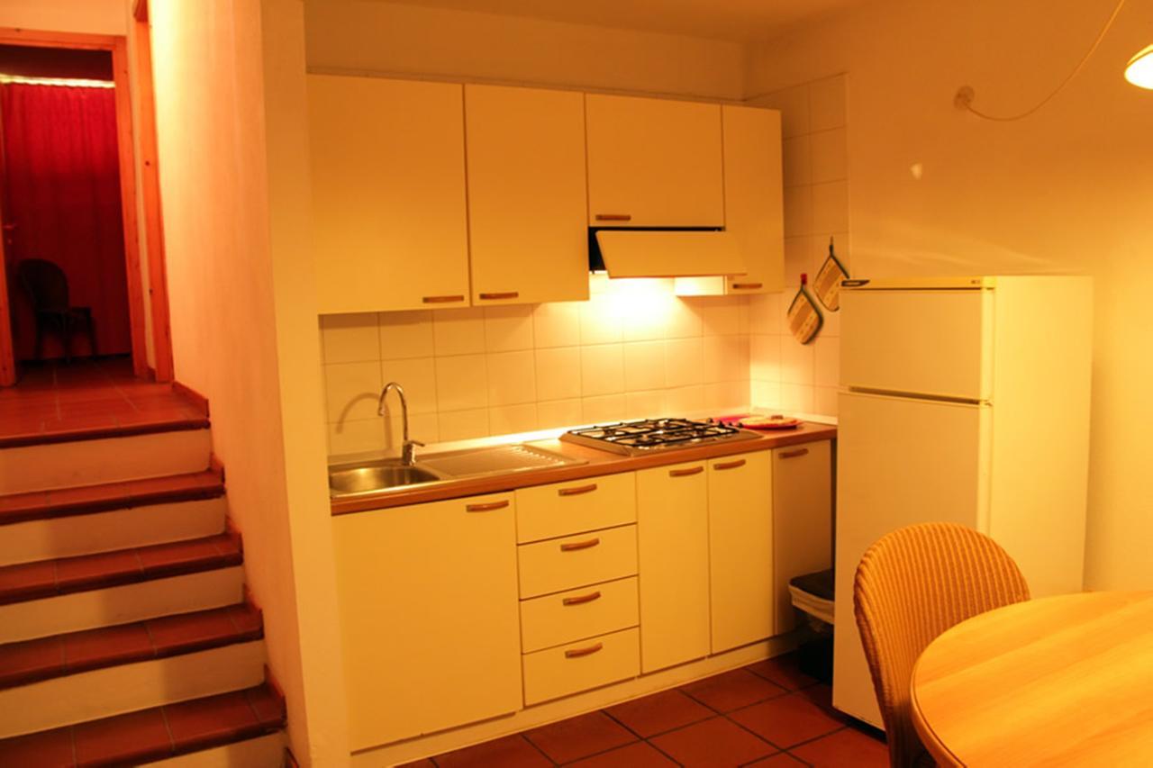 Residence Portolaconia Appartamenti Каниджоне Стая снимка